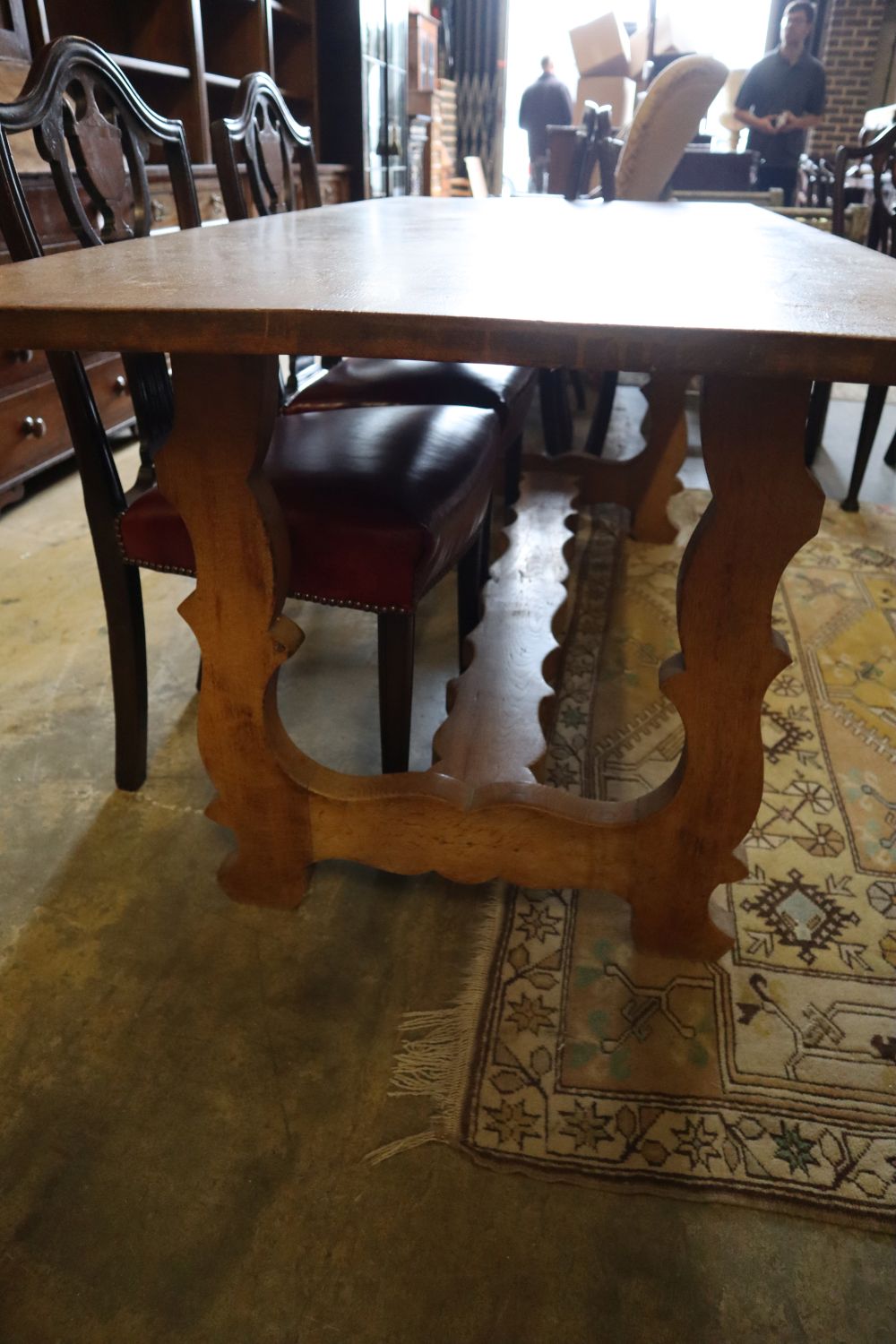 A Spanish style oak refectory dining table, width 183cm depth 80cm height 72cm